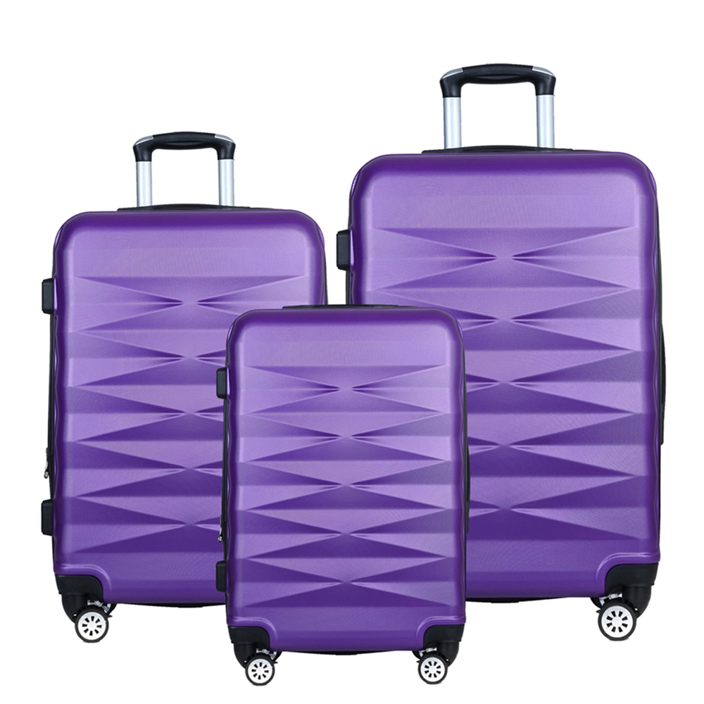 purple luggage in different sizes