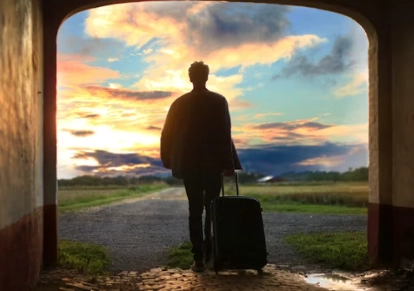 a man holding luggage