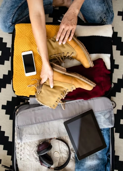 woman packing a luggage