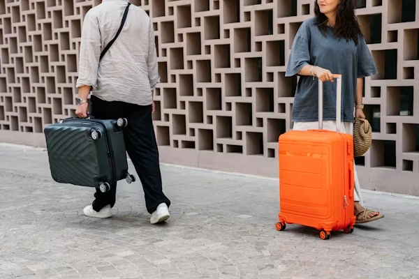 black and orange luggage
